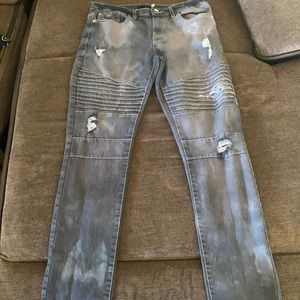 Grayish ripped jeans